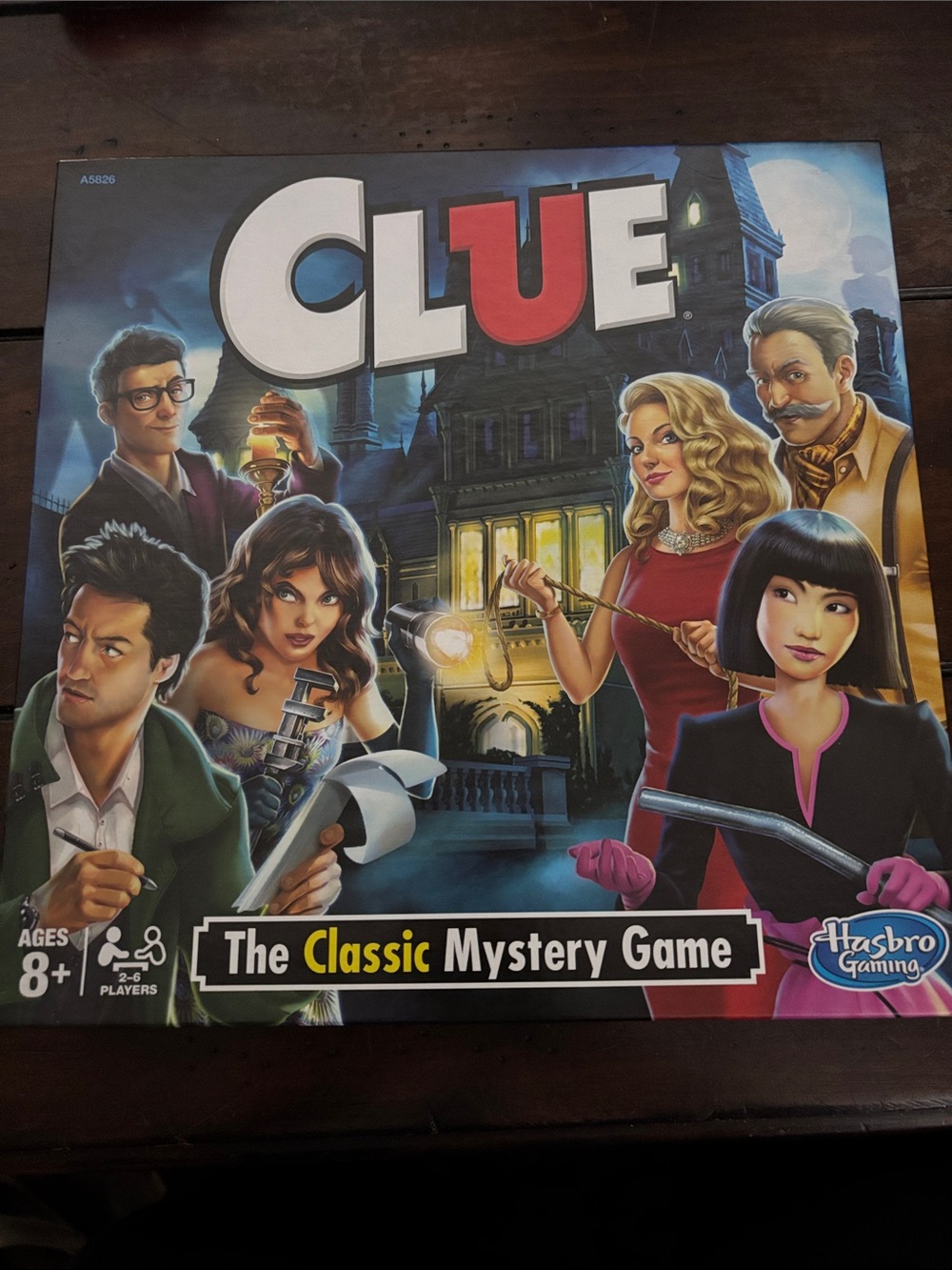 Hasbro CLUE Mystery Game — White, Red, Blue, Black